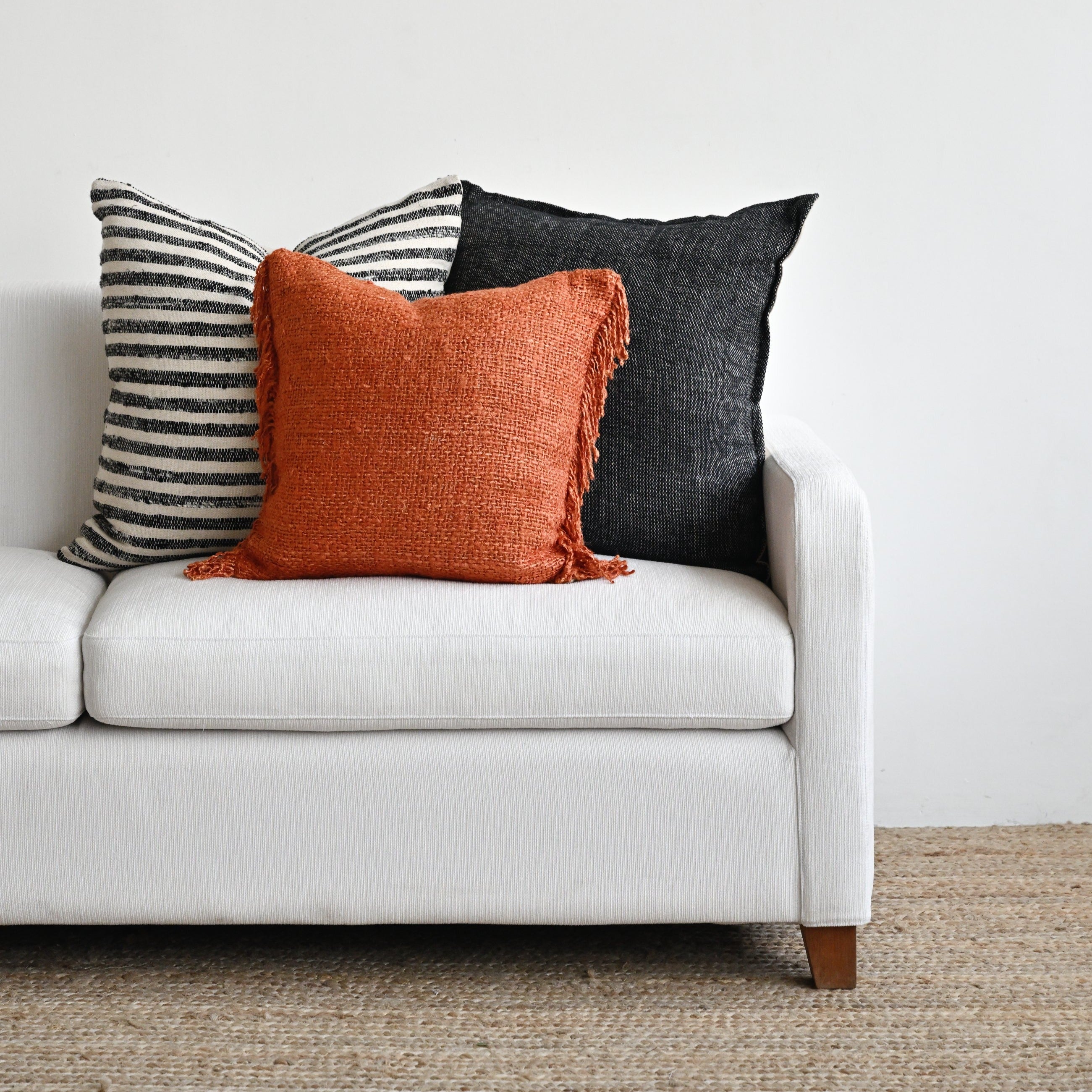 Orange throws outlet and cushions